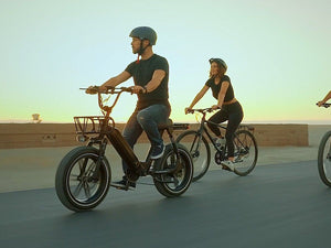 People Riding Electric Bicycles